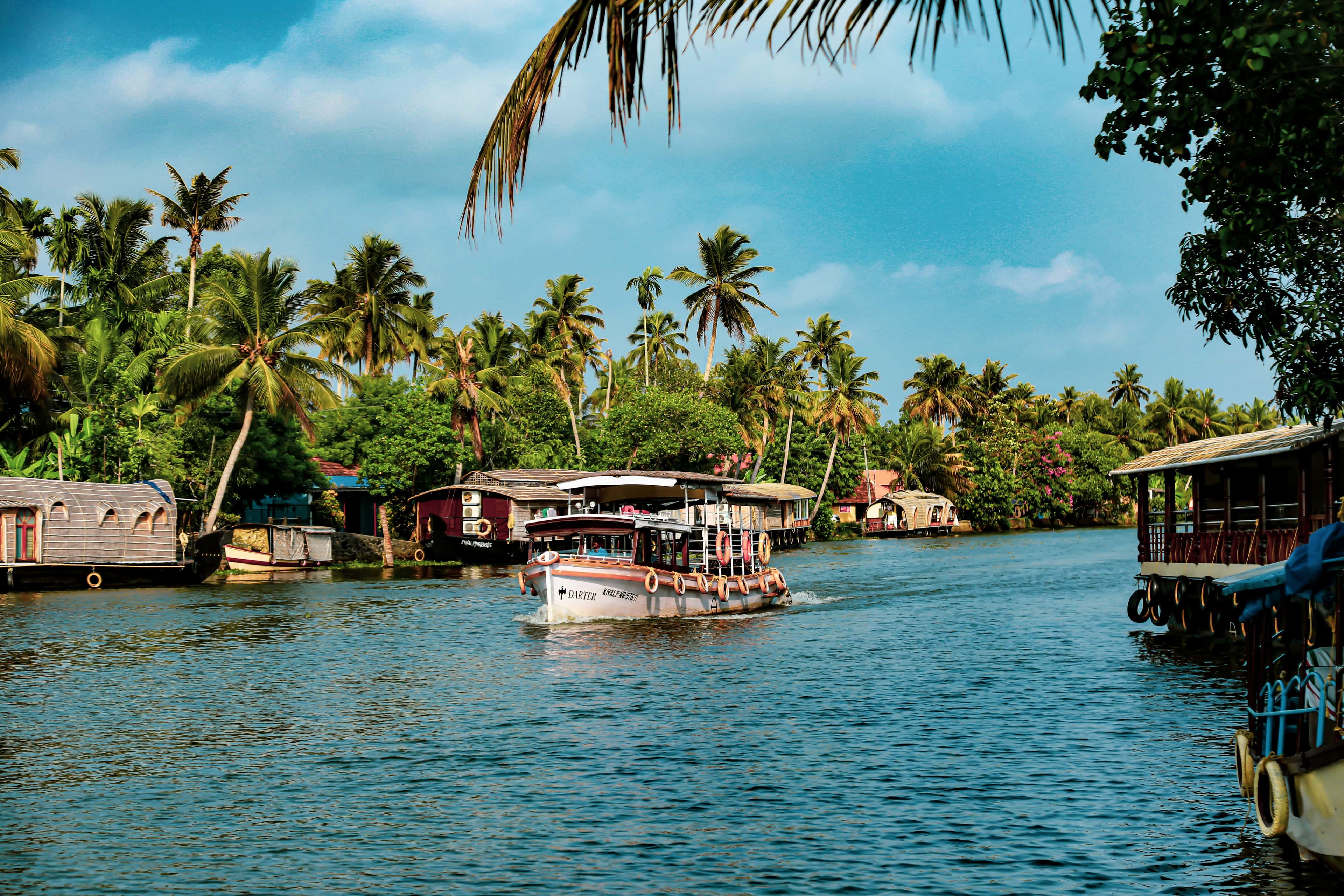 Small boat on still Kerala water