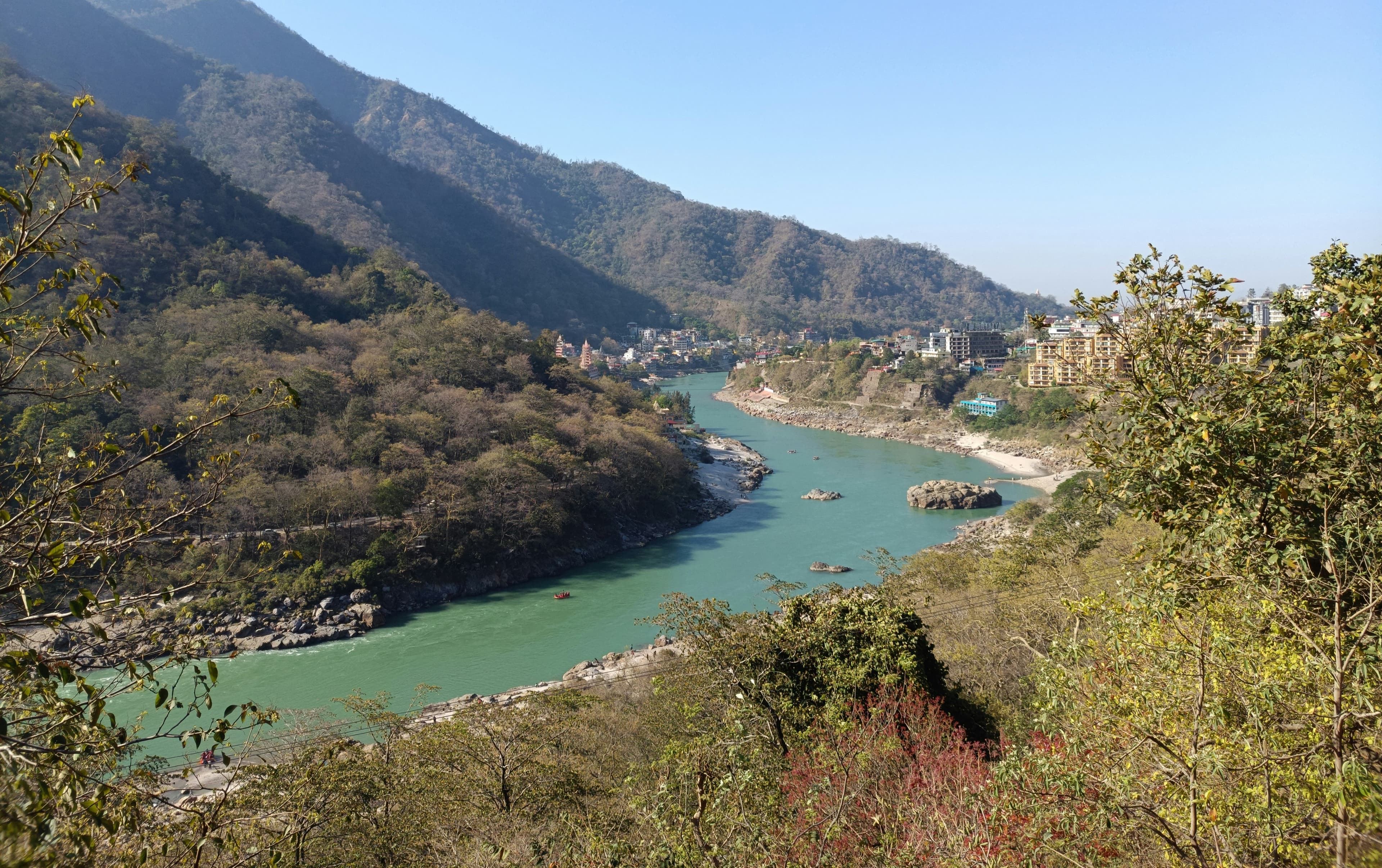 The Ganga flowing through forested hills