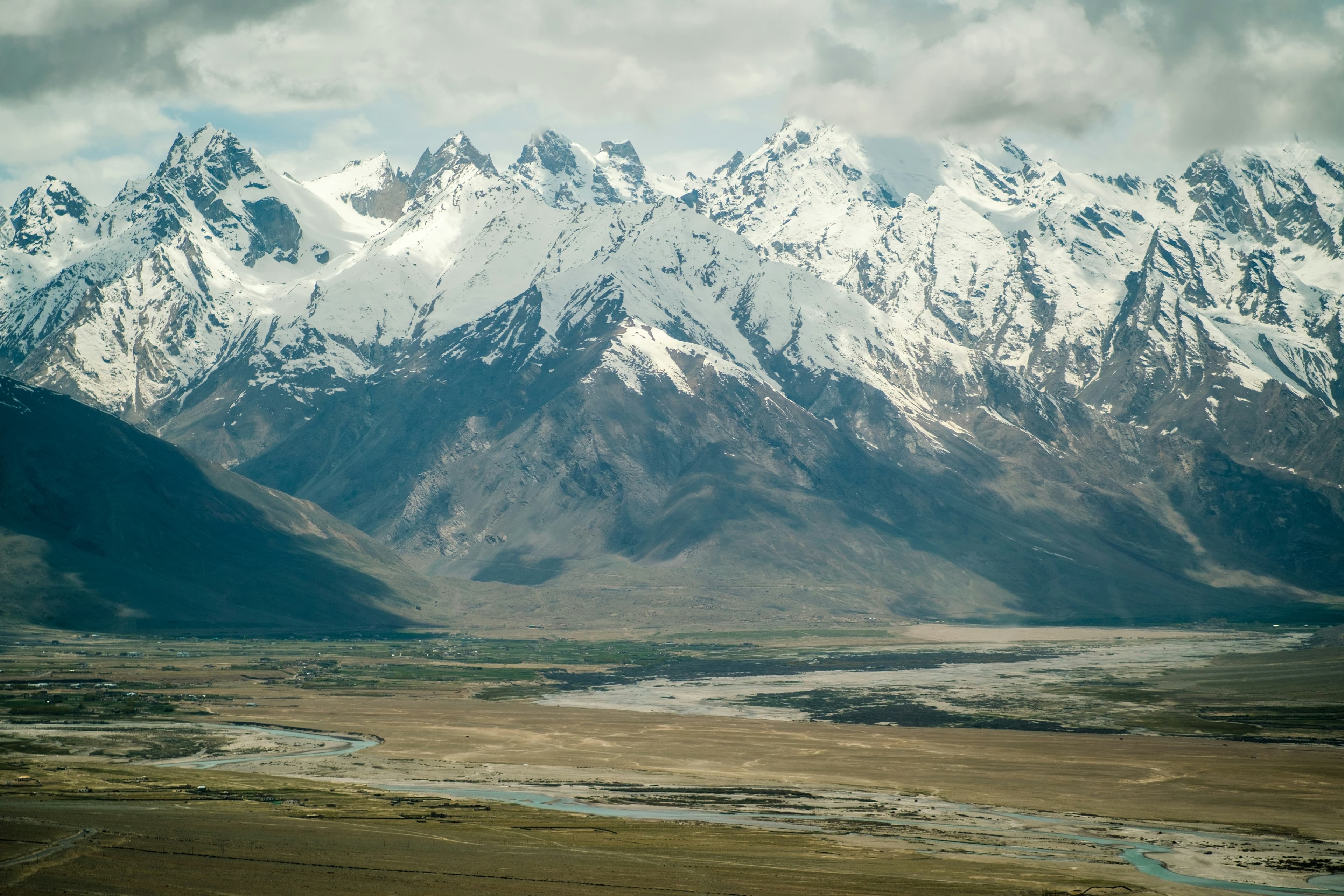 Mountain range with a river winding through the valley