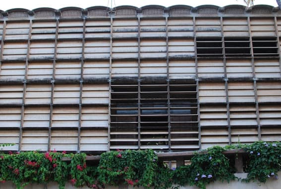 Louvred facade of Golconde, an Ashram residence designed by Antonin Raymond